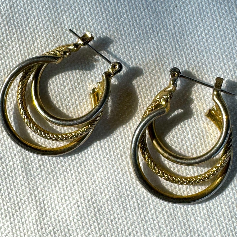 Gold tone and silver tone earrings